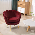 Fauteuil coquillage en velours rouge
